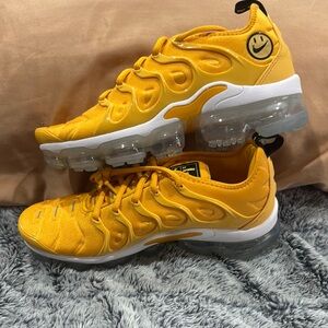 Nike Yellow Athletic Shoes with Ribbed Design and Air Cushion